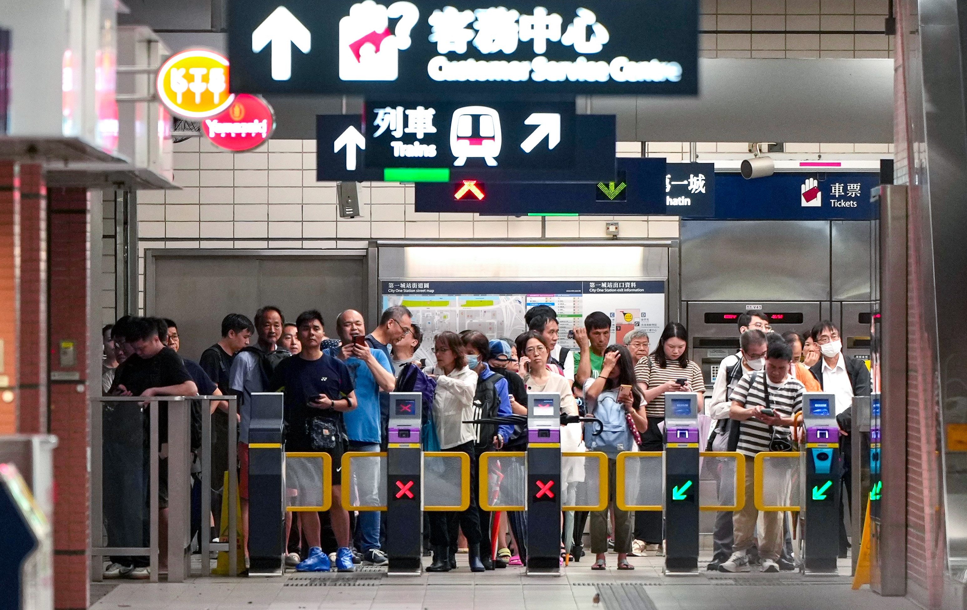 Passengers wait for MTR services at City One station. Photo: Sam Tsang