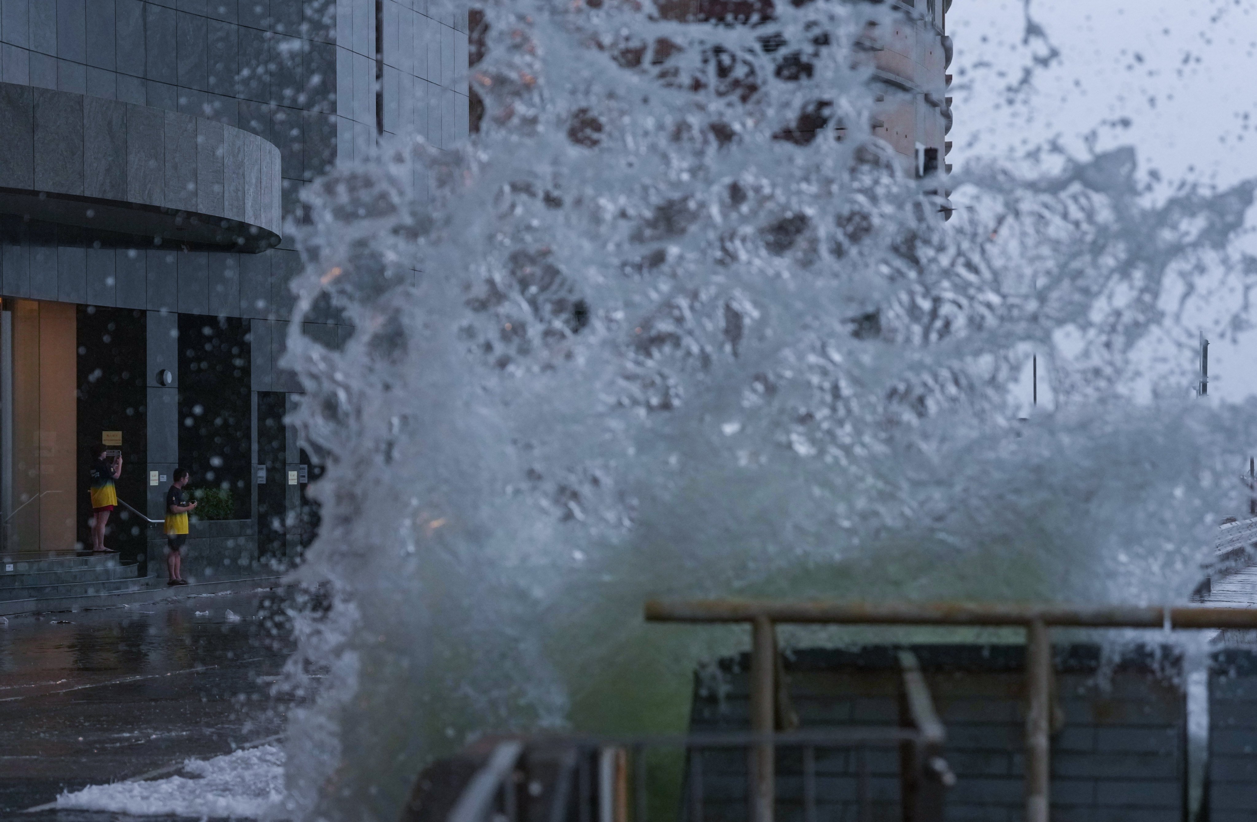 Waves crash onto the Kennedy Town promenade on Sunday morning. Photo: Karma Lo