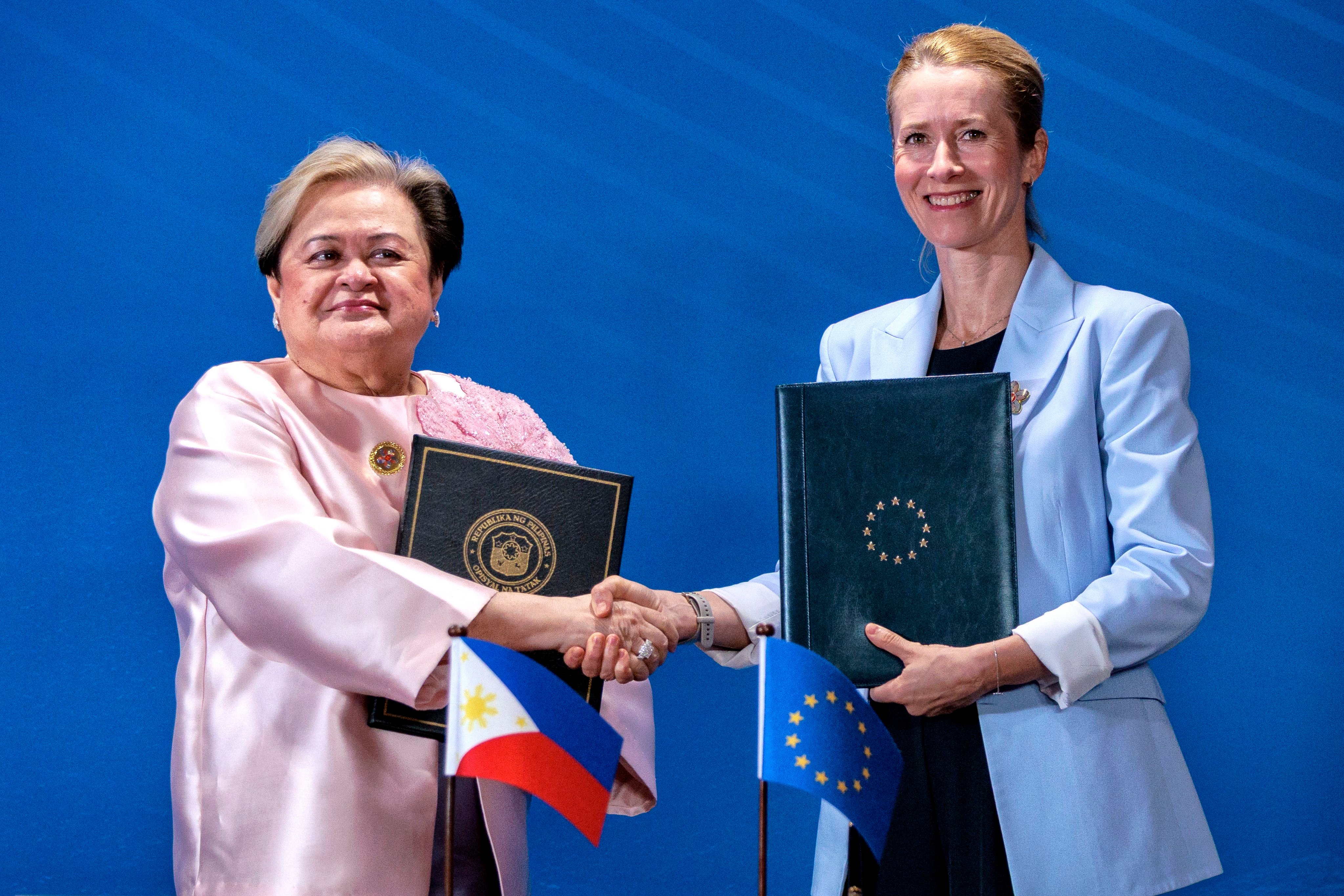 Philippines Foreign Secretary Theresa Lazaro (left) and EU European Commission Vice-President Kaja Kallas pose for photos after signing the Enhanced Partnership between the Philippines and the European Union on the sidelines of the Asean foreign ministers’ meeting in Pasay City, on Friday. Photo: EPA