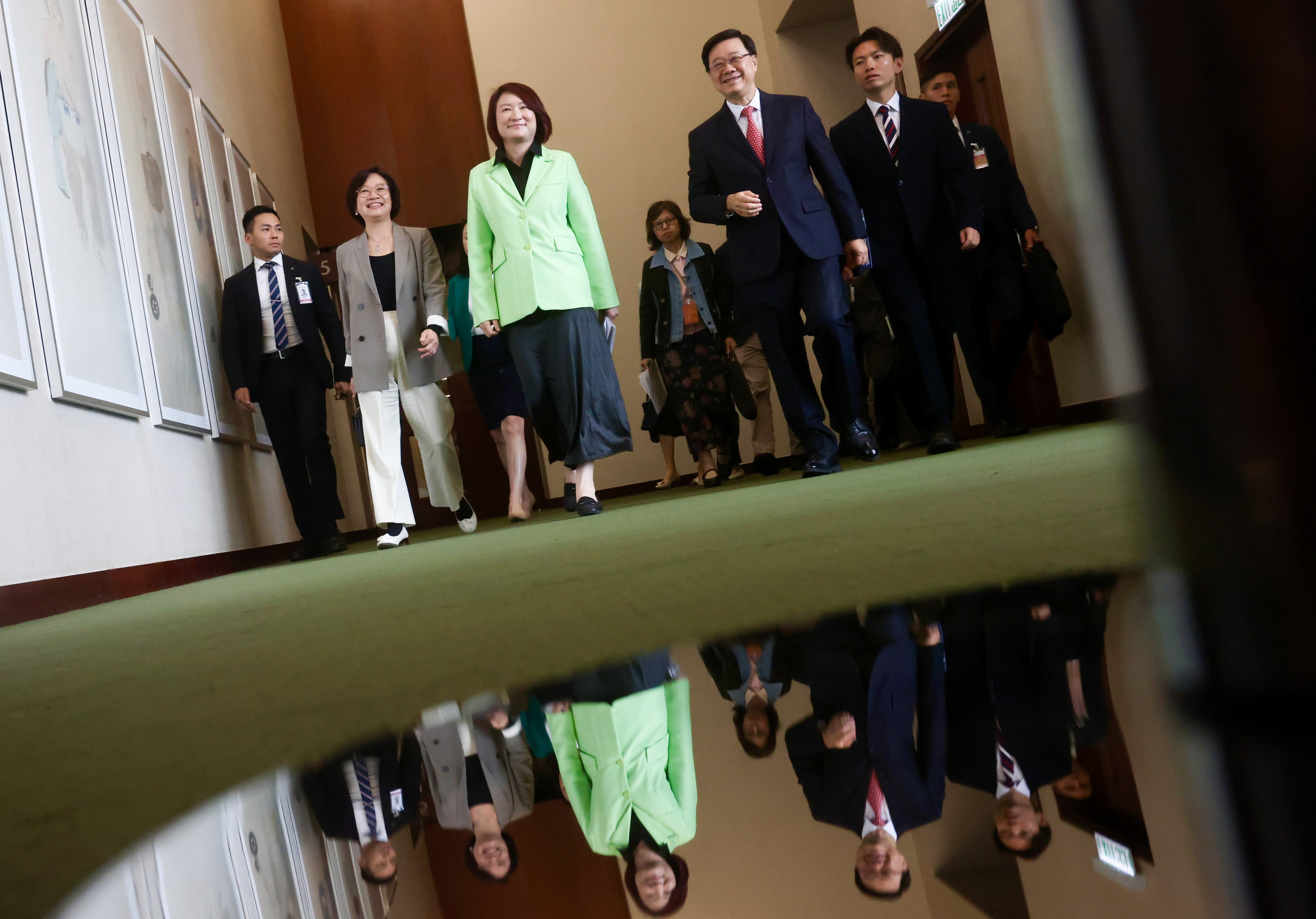 Legco president Starry Lee and Chief Executive John Lee depart the dialogue session together. Photo: Jonathan Wong