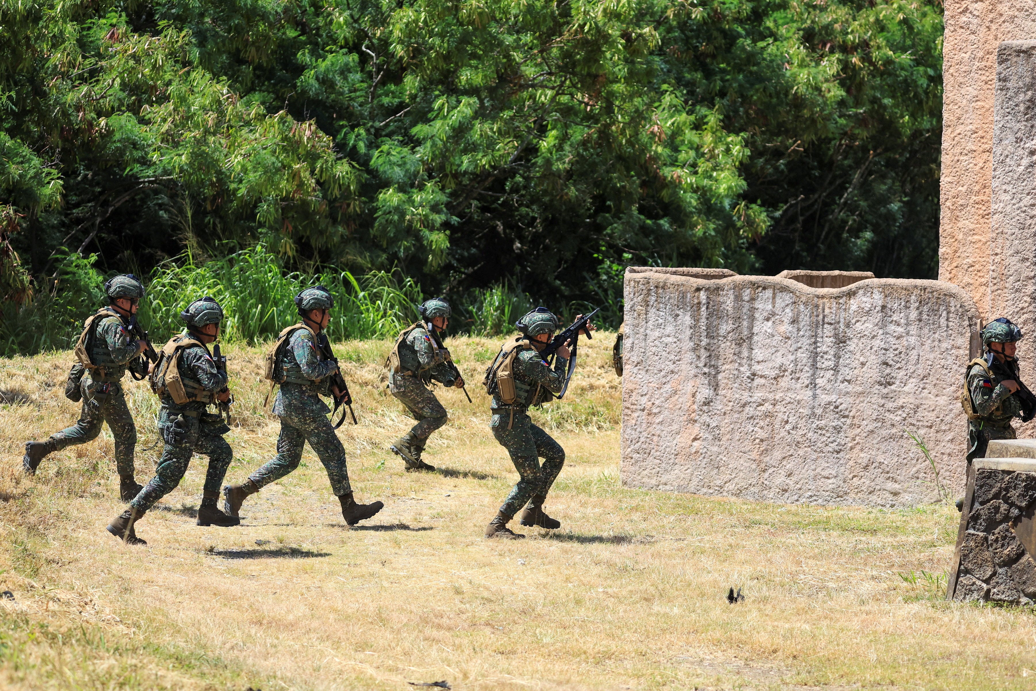 Philippine marines take part in a drill as part of the Rim of the Pacific military exercises held in Waimanalo, Hawaii, in June. Photo: Reuters