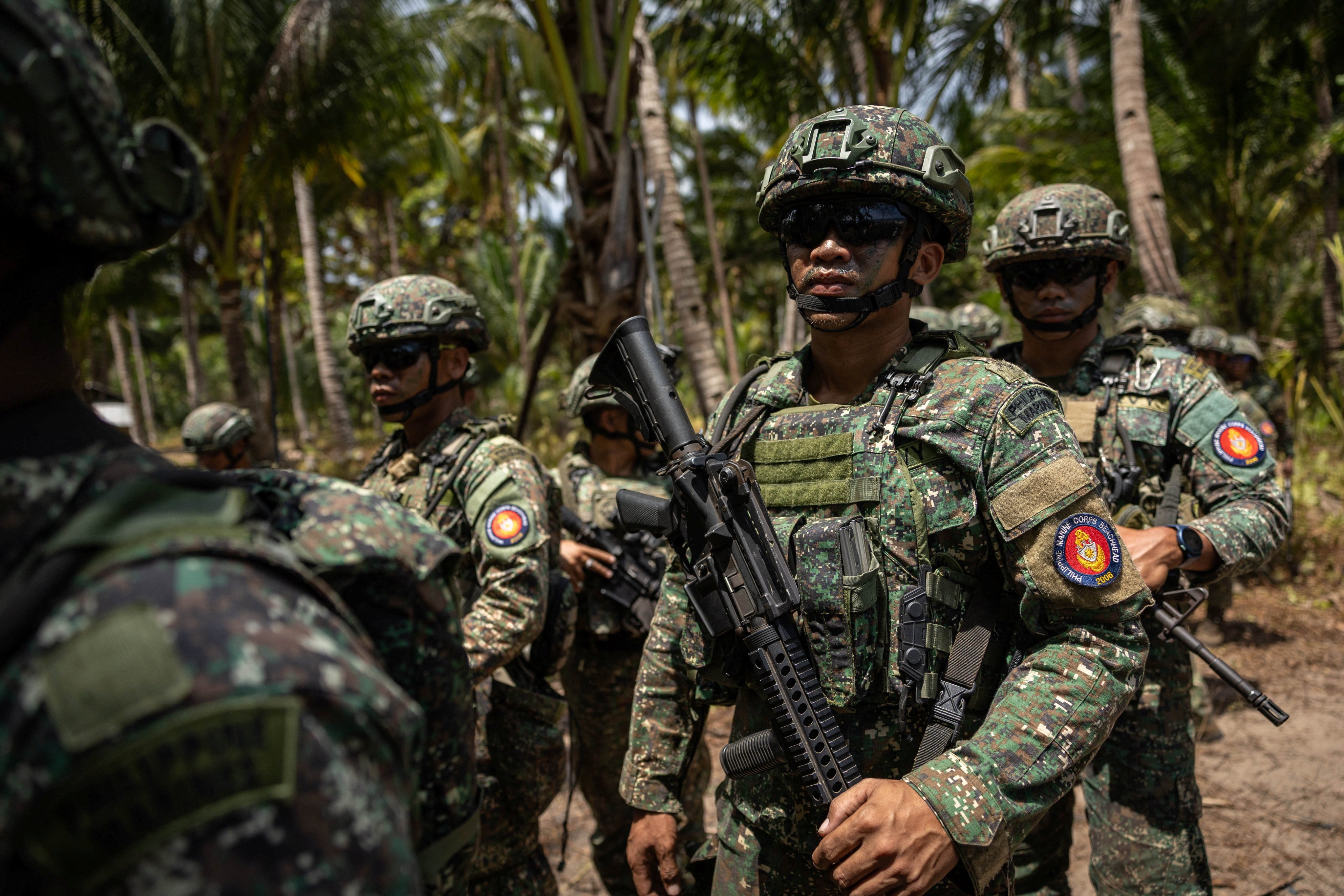 Philippine troops participate in live‑fire exercises during Balikatan, which also involves US soldiers, in Barangay Aporawan, Aborlan, Palawan, in April. Photo: Reuters