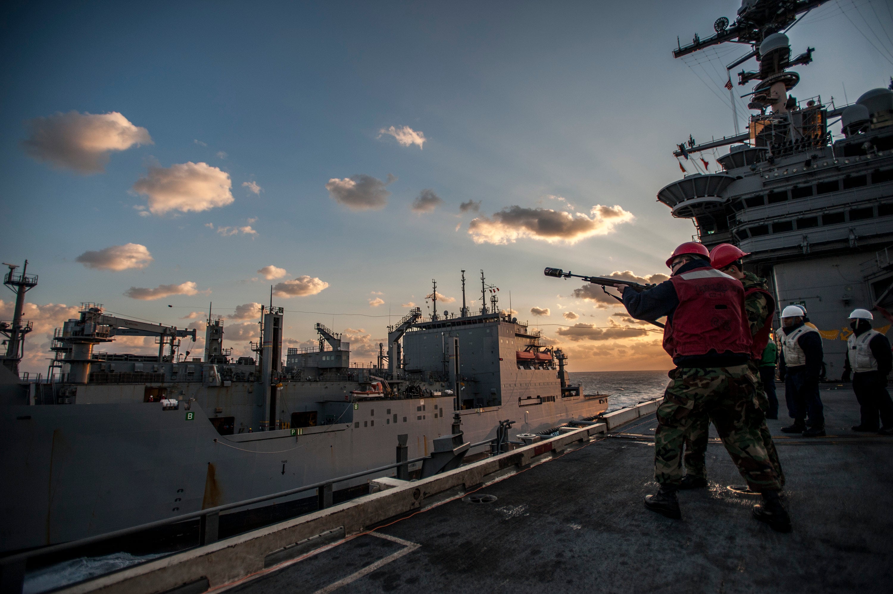Servicemen conduct weapons training on board the USS George Washington. Photo: US Navy