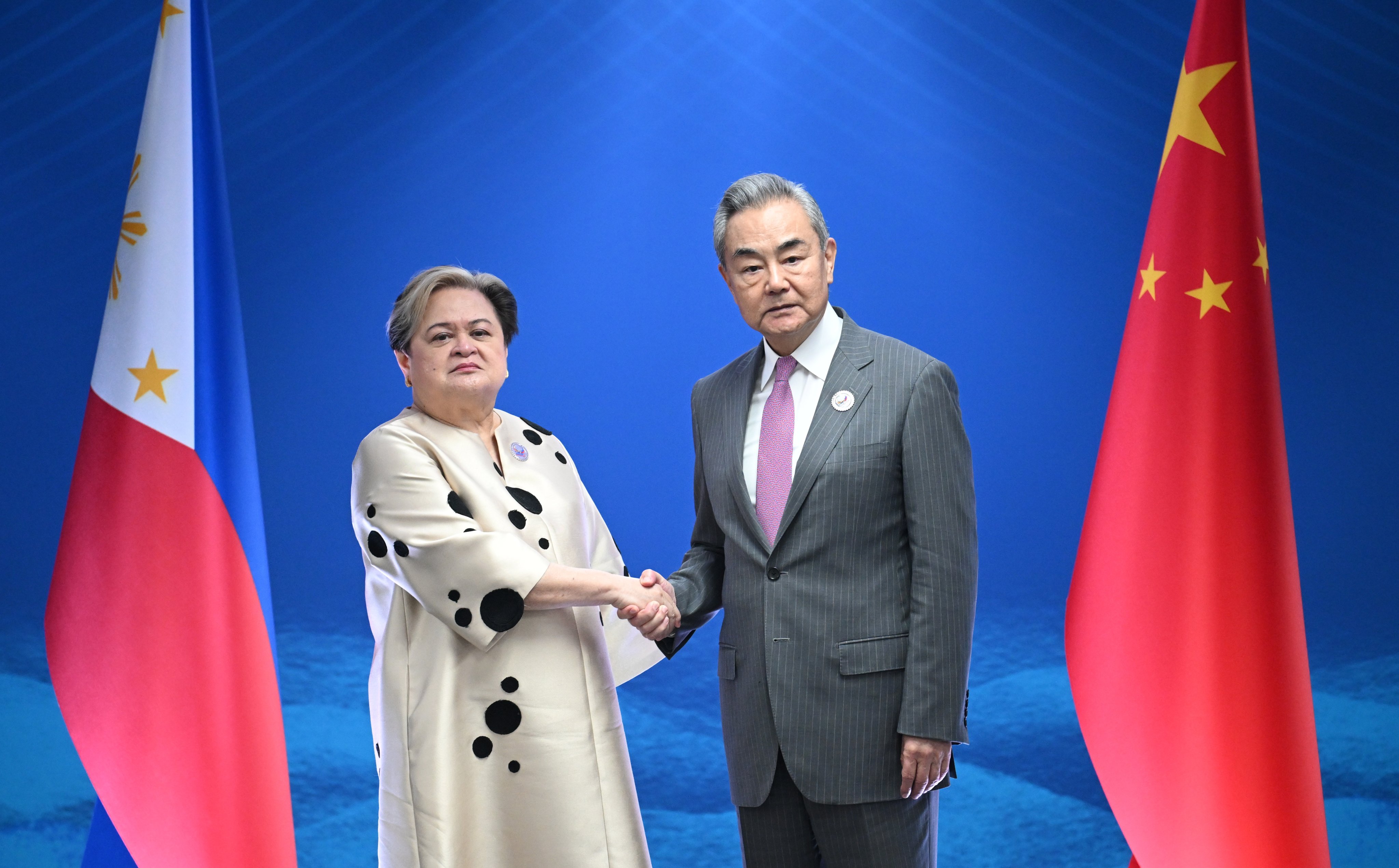 Philippine Secretary of Foreign Affairs Theresa Lazaro meets China’s Foreign Minister Wang Yi on the sidelines of the Asean Foreign Ministers’ Meeting in Pasay last Wednesday. Photo: EPA