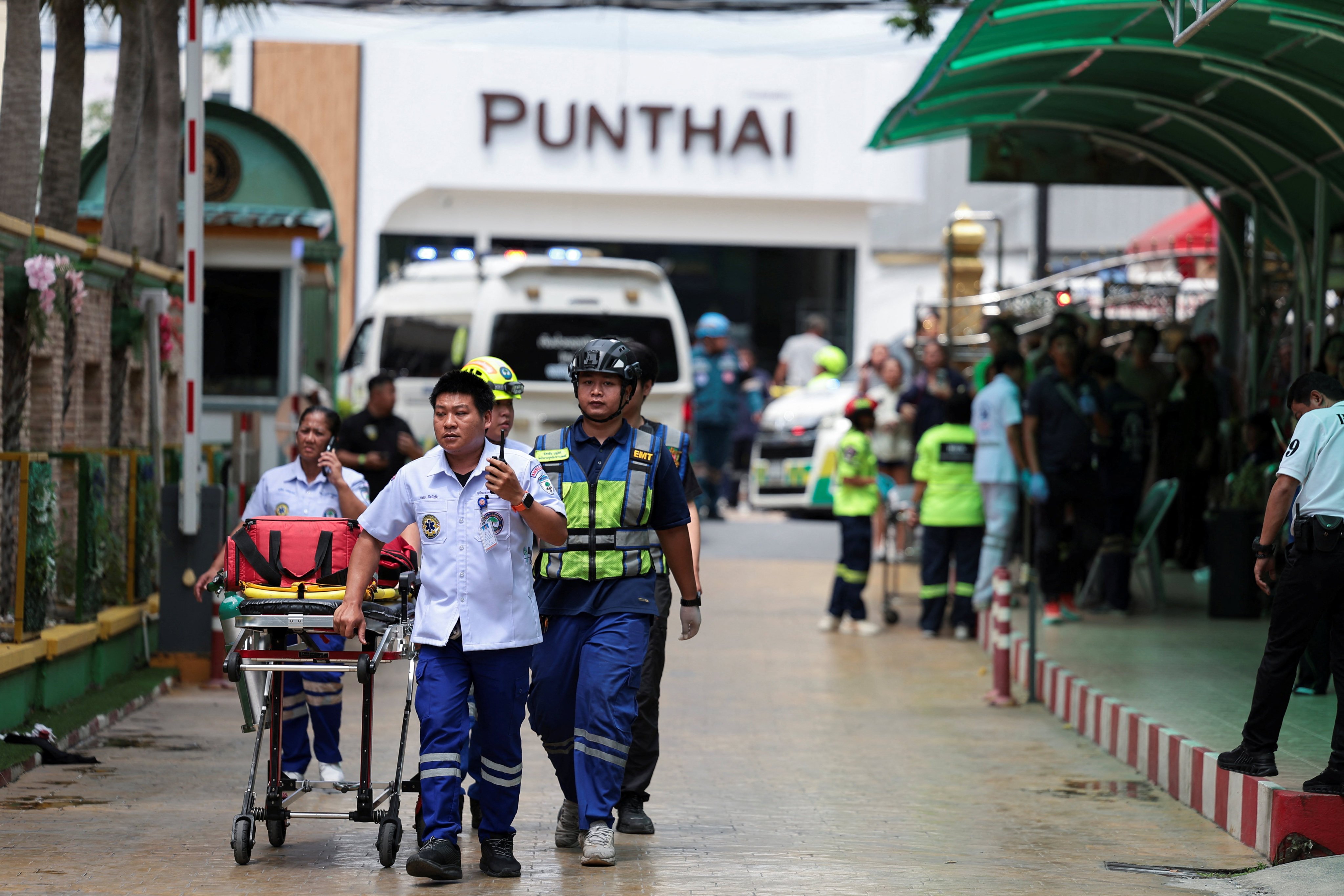 Emergency personnel work at the site of a school shooting in Nonthaburi province, Thailand, on Friday. Photo: Reuters