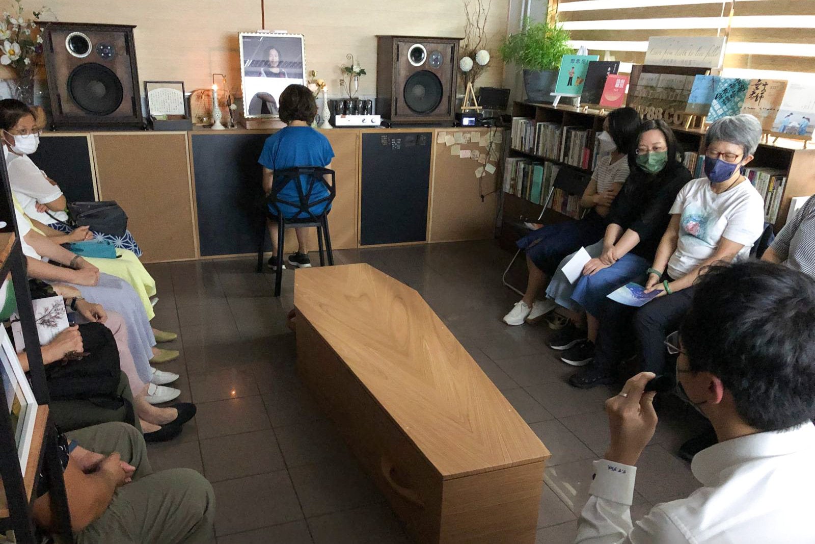 Regina Luk (in blue) organises a living funeral for her friends. Photo: Handout