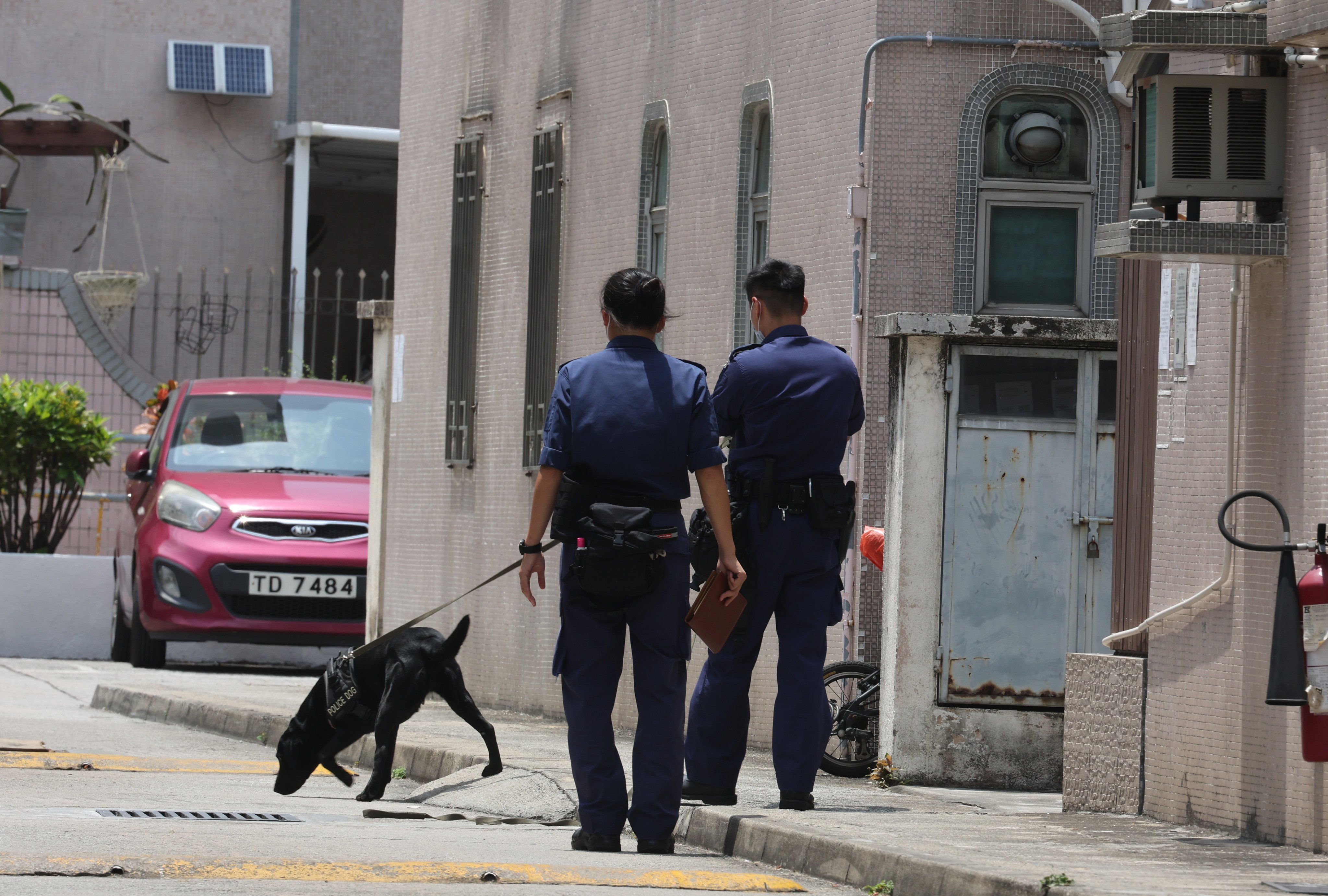 Police officers at the crime scene at Tin Ha Road in late April 2022. Photo: Edmond So