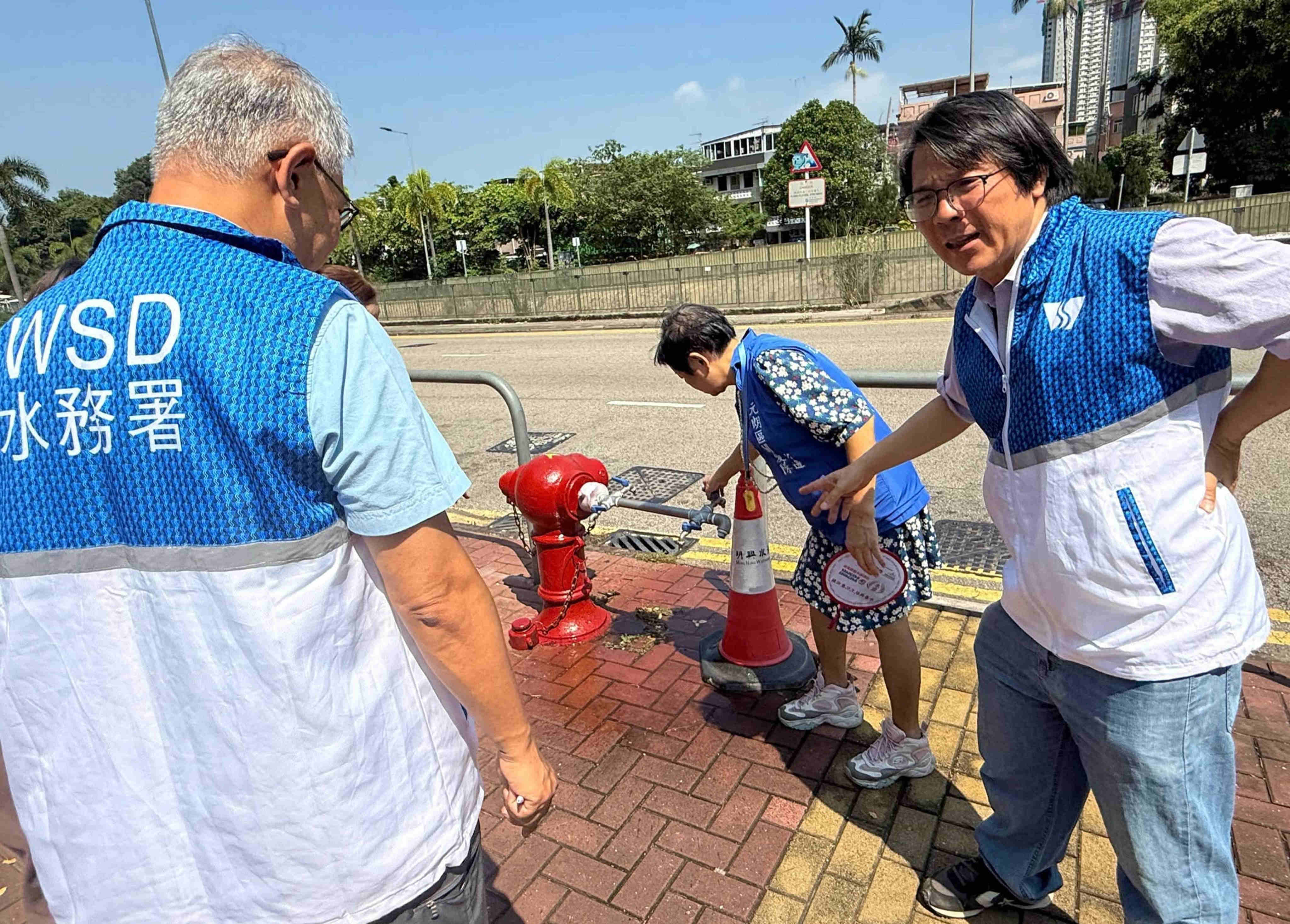Employees from the Water Supplies Department were among those assembled in response to a power outage at Shui Pin Wai Estate in Yuen Long. Photo: Handout