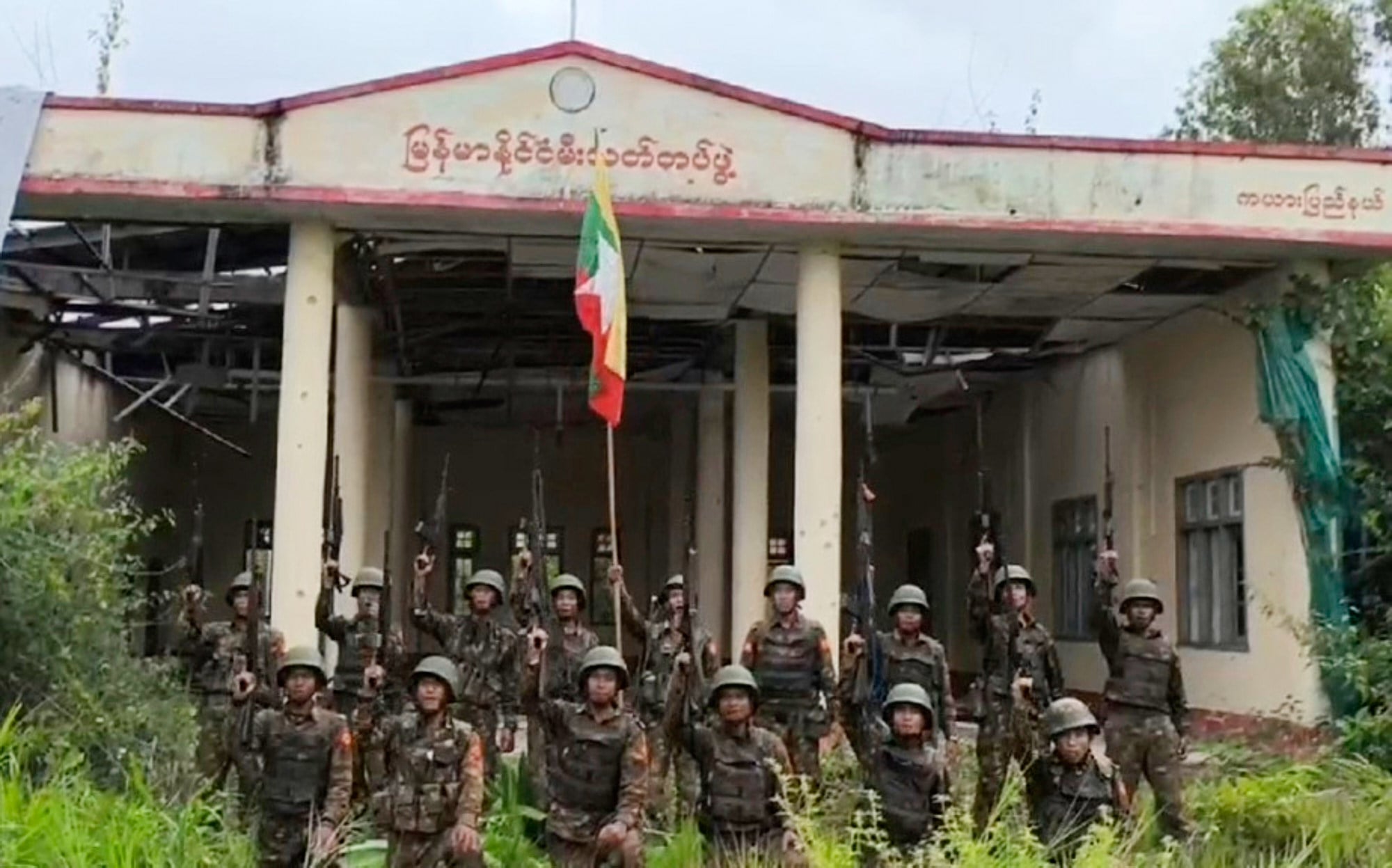 Army soldiers pose in front of a captured fire department station in Myanmar’s eastern state of Kayah in August last year. Photo: AP
