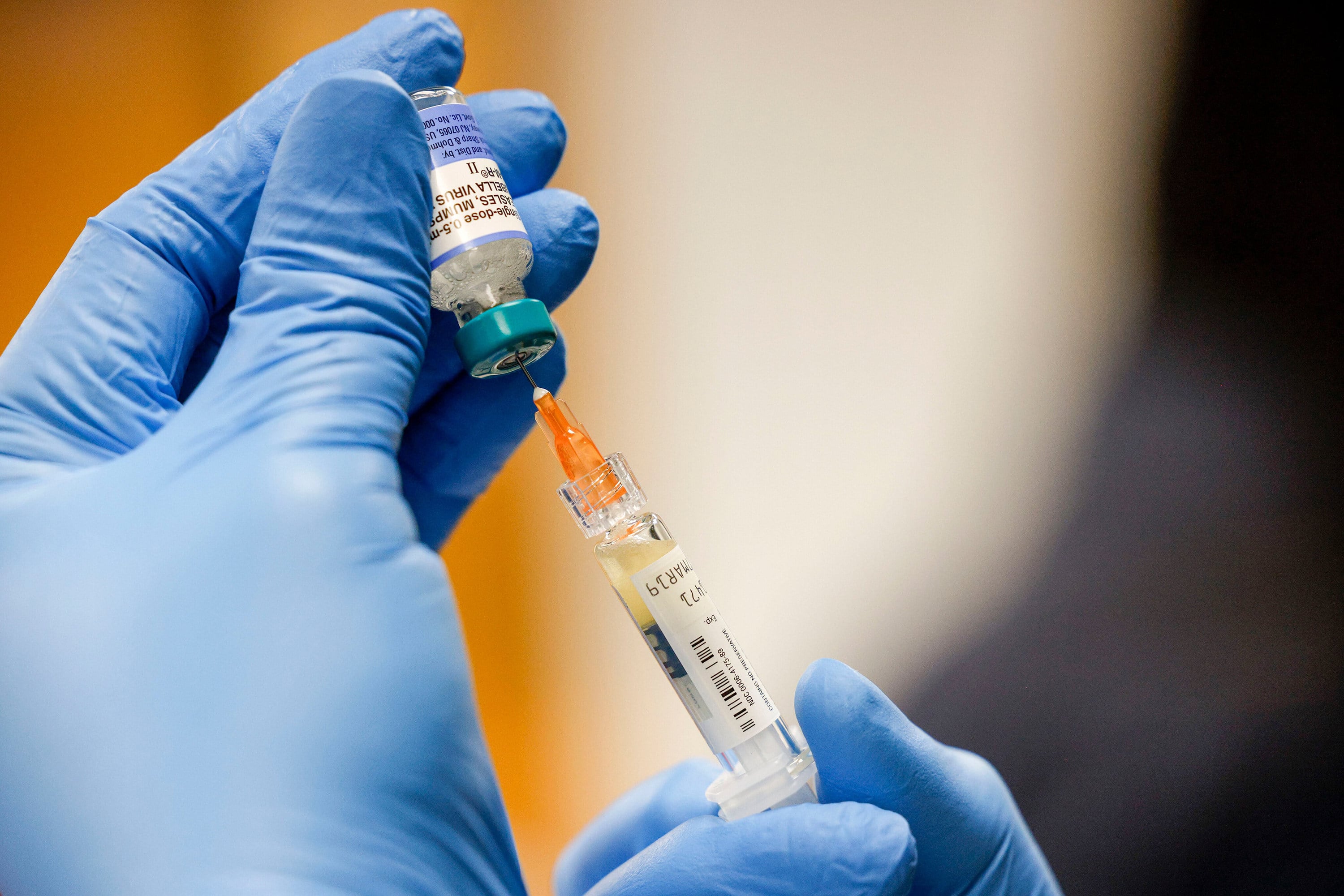 A nurse mixes a dose of the measles, mumps and rubella virus vaccine at a pop-up clinic in Carrollton, Texas. Photo: TNS
