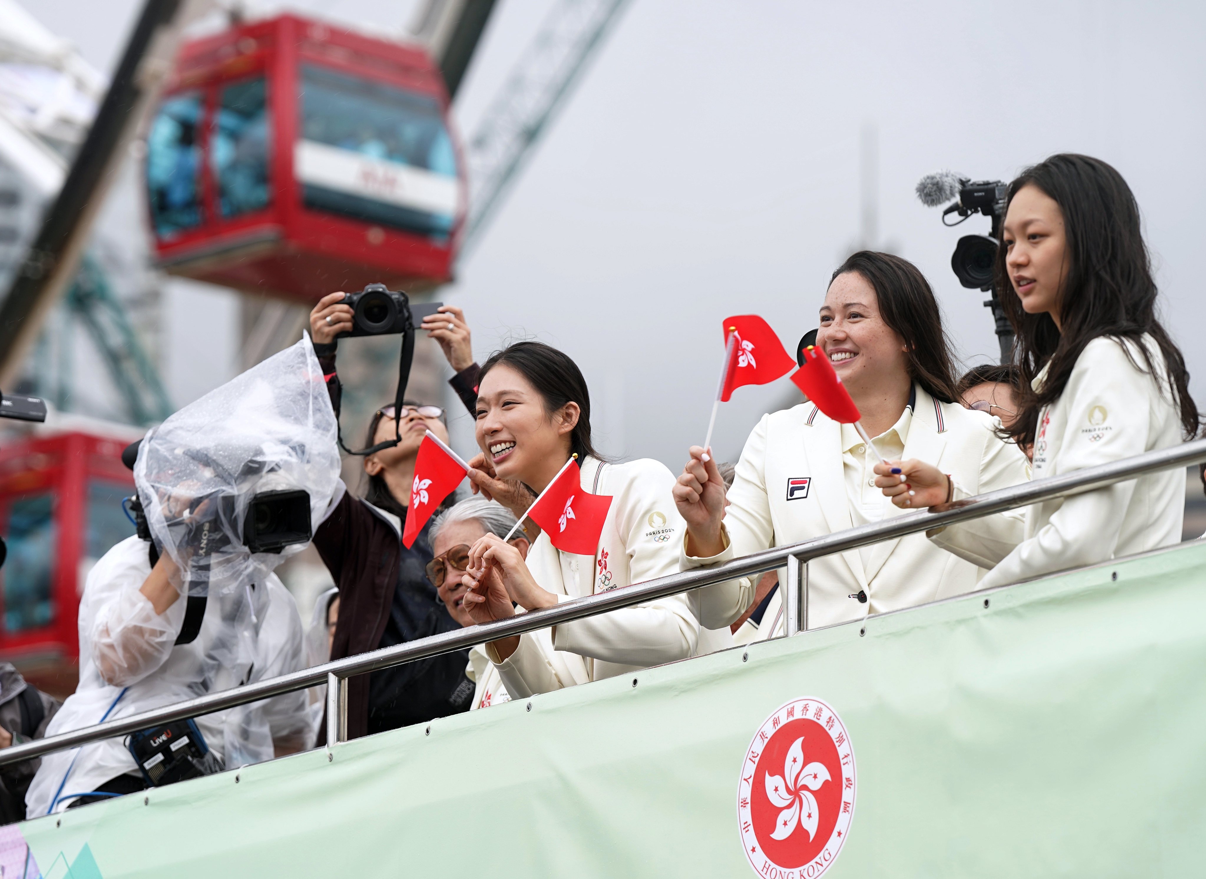 (From left) Hong Kong Olympians Vivian Kong, Siobhan Haughey and Cindy Cheung receive a warm welcome after the 2024 Paris Olympics. Photo: Elson Li