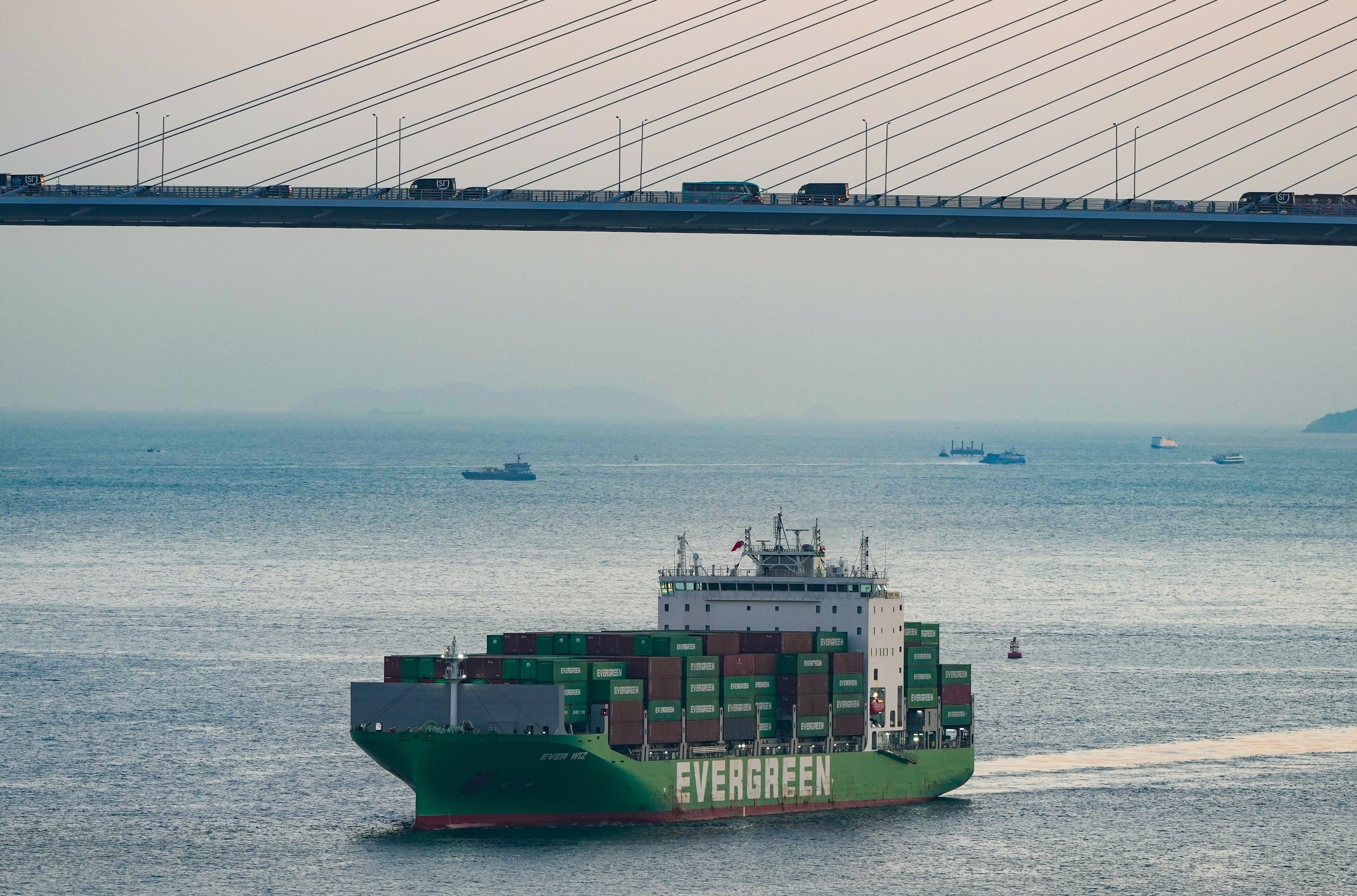 A ship sails into Hong Kong's Kwai Chung container port. The survey found that 83 per cent of respondents saw the city as their first choice for a services platform to support their expansion. Photo: Sam Tsang