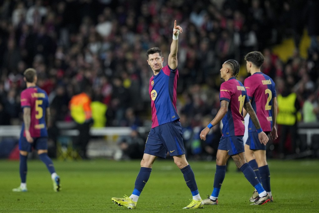 Star striker Robert Lewandowski celebrates after scoring for Barcelona in a recent Champions league match. Photo: EPA-EFE