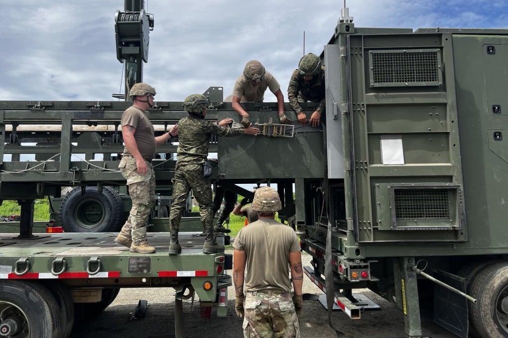 Soldiers prepare a reload fixture of the Typhon system during a drill in the Philippines in 2024. Photo: US army