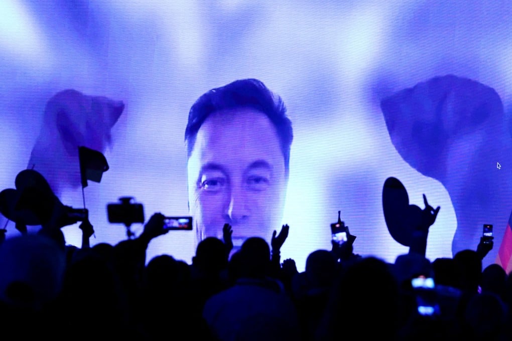 SpaceX CEO Elon Musk speaks on-screen during an AfD campaign event in Halle, Germany, on Saturday. Photo: Reuters