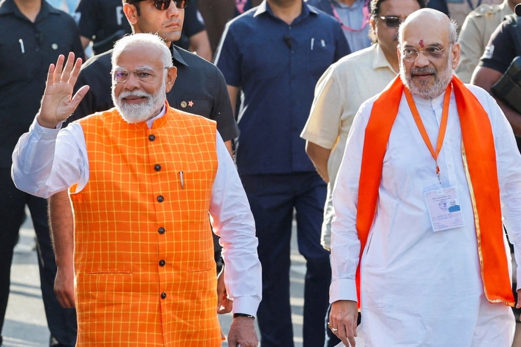 India’s Prime Minister Narendra Modi (left) walks alongside Amit Shah, Indian Home Minister in Ahmedabad, India on May 7, 2024. Photo: Reuters