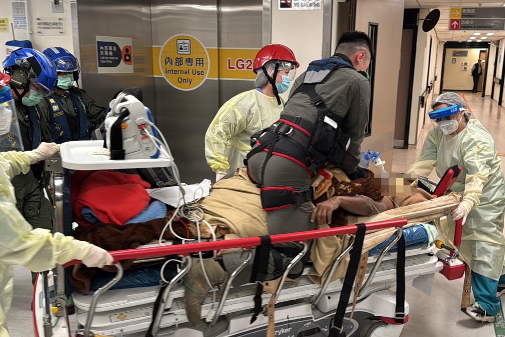 A first responder performs cardiopulmonary resuscitation on the man as he is rushed into Pamela Youde Nethersole Eastern Hospital in Chai Wan. Photo: Handout