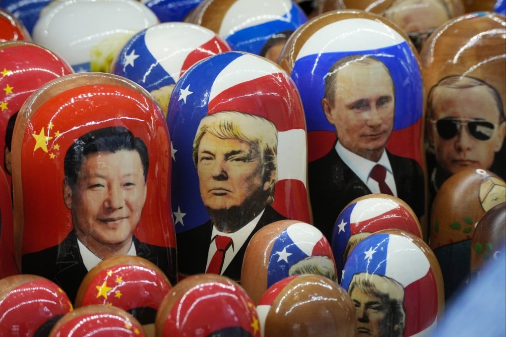 Traditional Russian wooden dolls called matryoshka depicting President Xi Jinping, US President Donald Trump and Russian President Vladimir Putin are displayed for sale at a souvenir shop in St. Petersburg, Russia, on November 21, 2024. Photo: AP