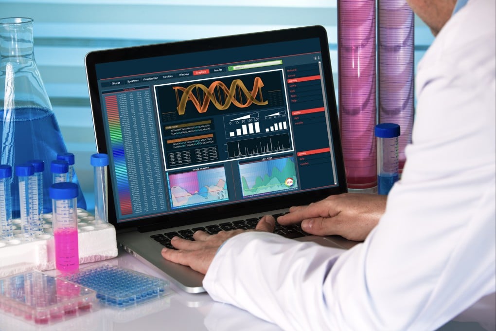 A genetic engineer working with analysis DNA software. Photo: Shutterstock