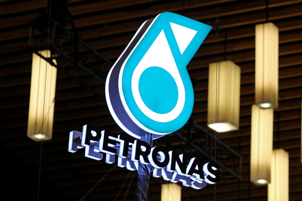 The Petronas logo is displayed at the LNG 2023 energy trade show in Vancouver, Canada in July 2023. Photo: Reuters