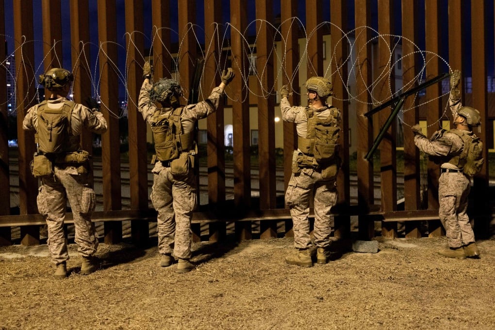 US Marines installing concertina wire along the southern border with Mexico near San Ysidro, California. Photo: US Department of Defence via AFP