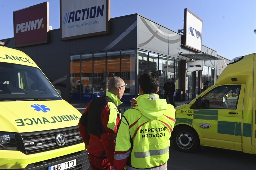 Police and ambulances at a a shopping area in Hradec Kralove, Czech Republic, where two women died after a knife attack on February 20, 2025. Photo: AP