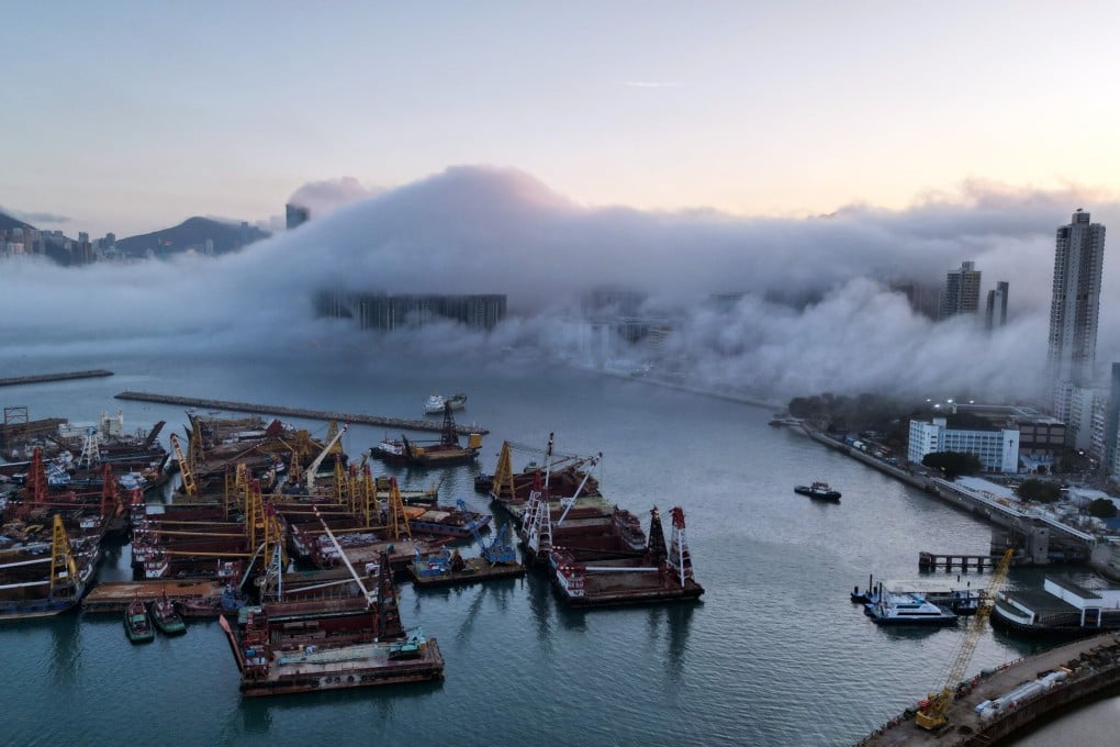 Fog blankets Hong Kong’s famed Victoria Harbour on Sunday afternoon. Photo: Sam Tsang