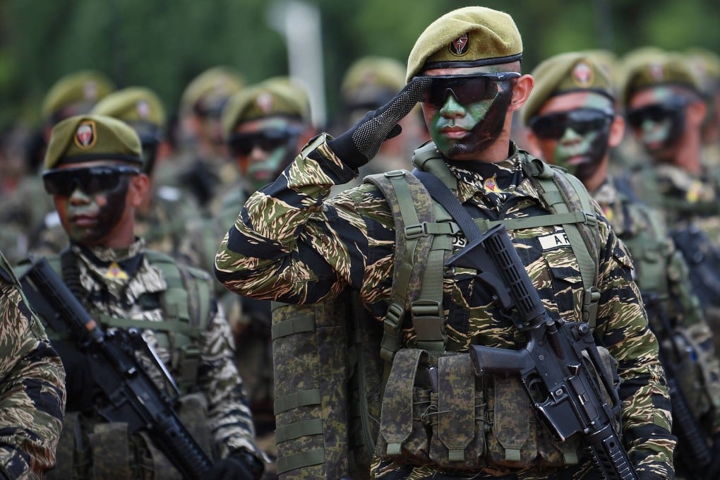 Soldiers march during a military parade held to mark the 89th founding anniversary of the Armed Forces of the Philippines at Camp Aguinaldo in Manila on December 20, 2024. Photo: AFP