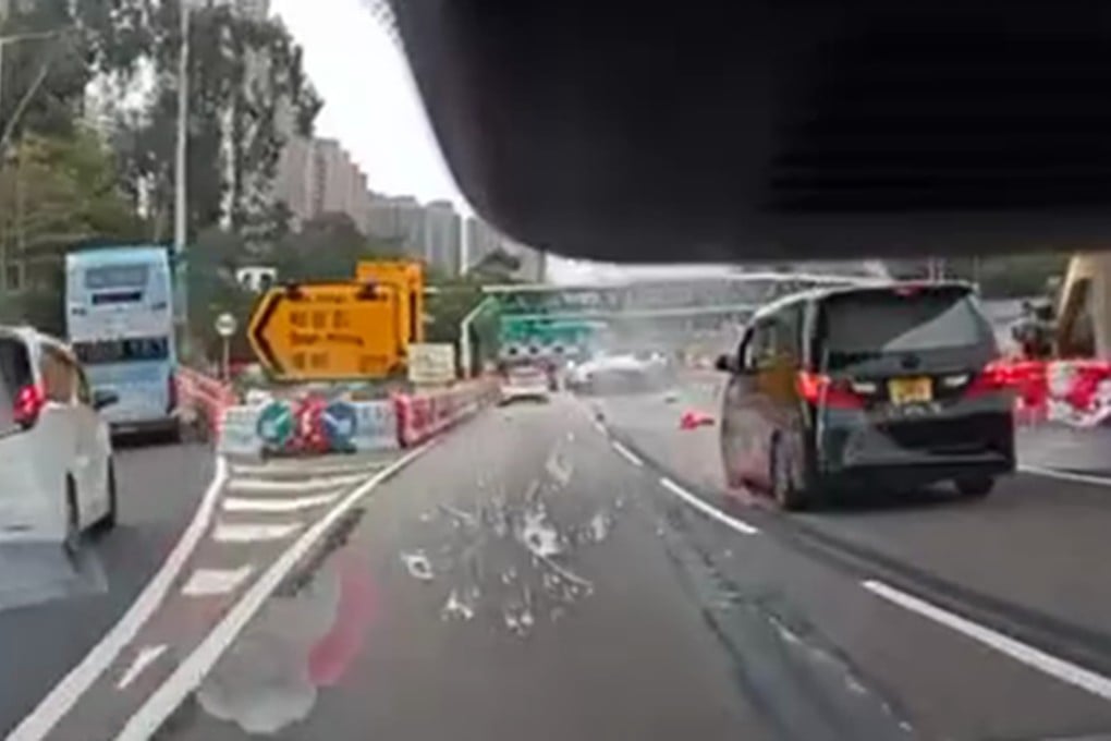 A screengrab shows the white car rolling over in an adjacent lane. Photo: SCMP
