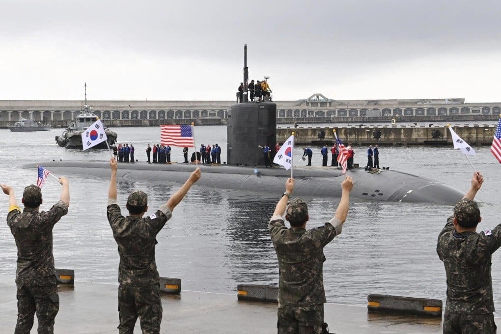 South Korean navy sailors wave as the USS nuclear-powered submarine USS Annapolis arrives at a South Korean naval base on Jeju Island in 2023. Photo: AP