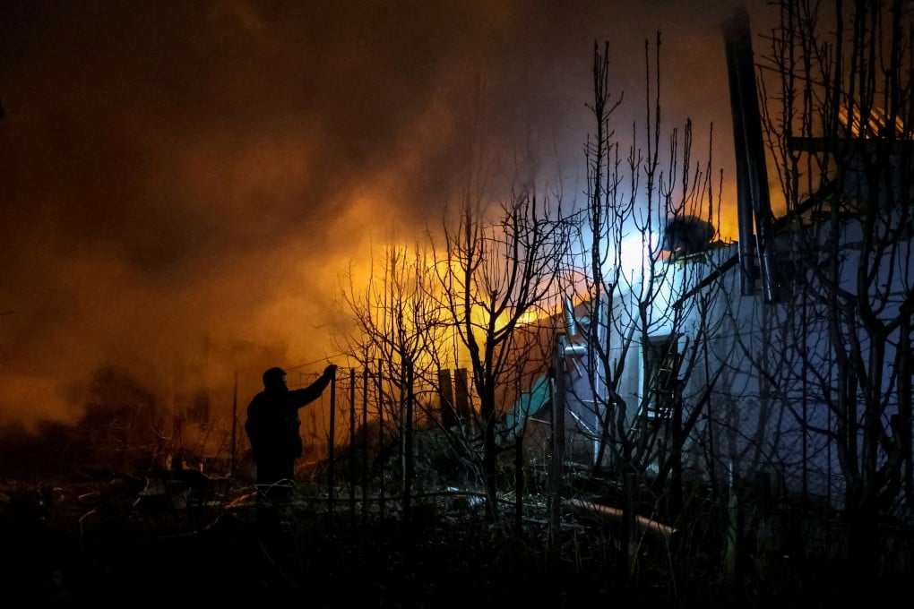 Rescuers work at the site of a building destroyed during a Russian air strike in Kherson, Ukraine on Friday. On Sunday, US officials said President Trump is expected to soon discuss a ceasefire deal with Russia’s Putin. Photo: Reuters