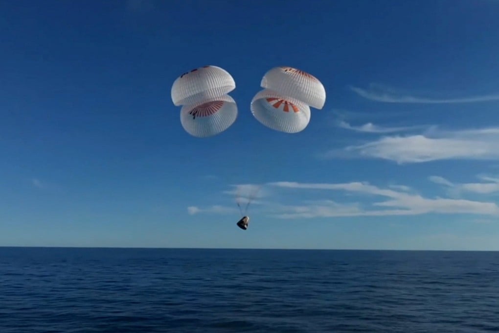The Crew Dragon capsule moments before splashdown off the coast of Florida on Tuesday. Photo: Nasa TV via Reuters