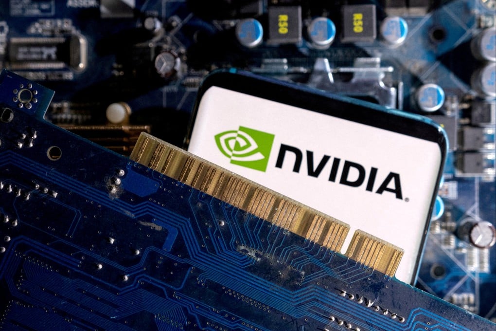 A smartphone with a displayed Nvidia logo is placed on a computer motherboard. Photo: Reuters