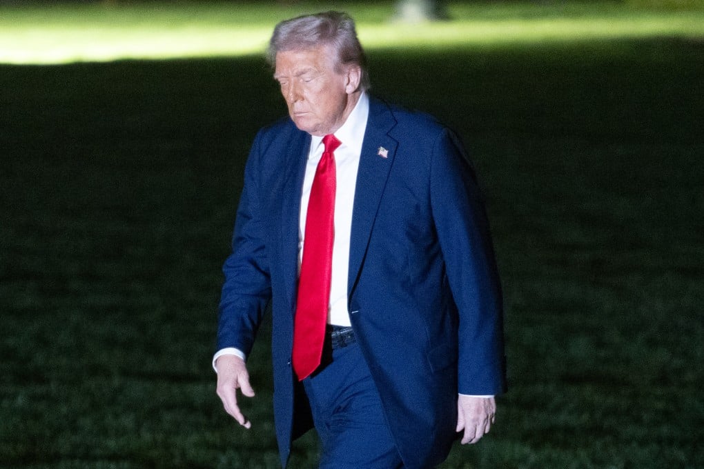 US President Donald Trump walks on the South Lawn upon his return to the White House. Photo: Xinhua