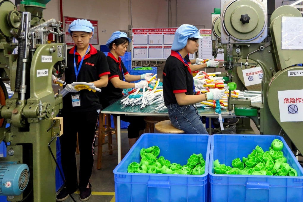 Employees work on a production line for children’s toys at a factory in Jiangxi province. Beijing has urged solidarity across the country after authorities unleashed a series of countermeasures against US tariffs on on Friday. Photo: Reuters