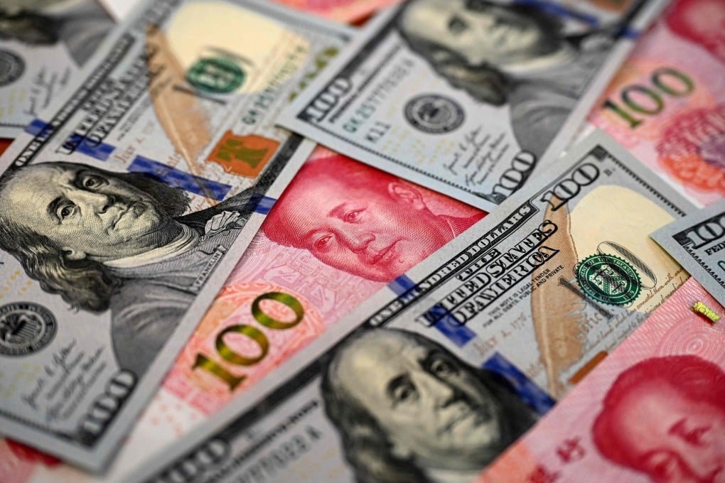 The offshore yuan tumbled 1.1 per cent to 7.4290 per US dollar in New York trading late on Tuesday. Photo: AFP