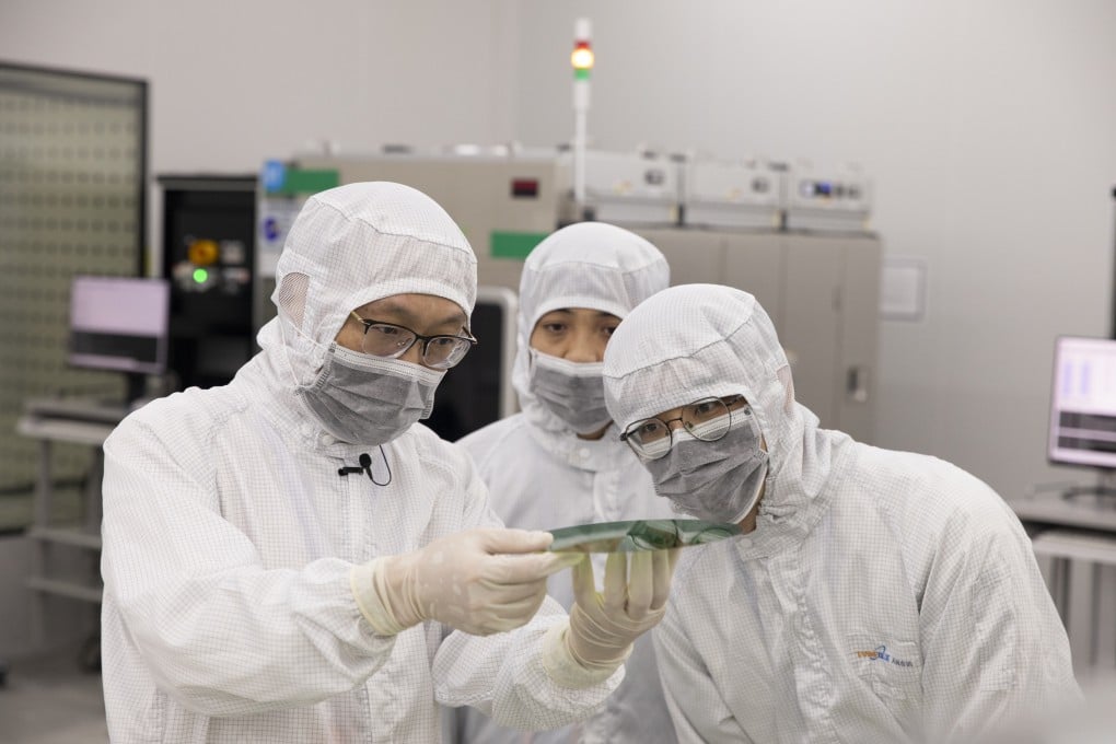 Researchers examine semiconductor materials in a lab. A new scientific journal ranking system introduced by Beijing is intended as a “positive guide” to help elevate the work of the nation’s leading scientists. Photo: Xinhua
