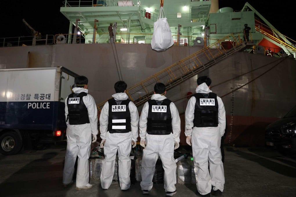 South Korean police monitor a suspect shipment being unloaded at a port in Gangneung earlier this month. Officials have warned that foreign companies might try to use South Korea to bypass US tariffs. Photo: Korea Customs Service/Yonhap/AFP