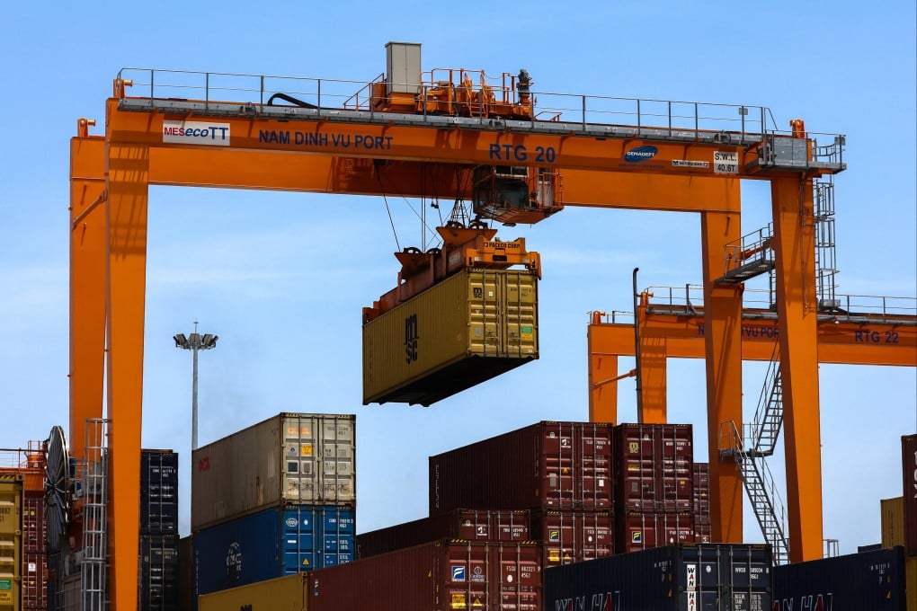 A container is loaded onto a cargo ship while docked at Hai Phong port in Vietnam. Photo: Reuters