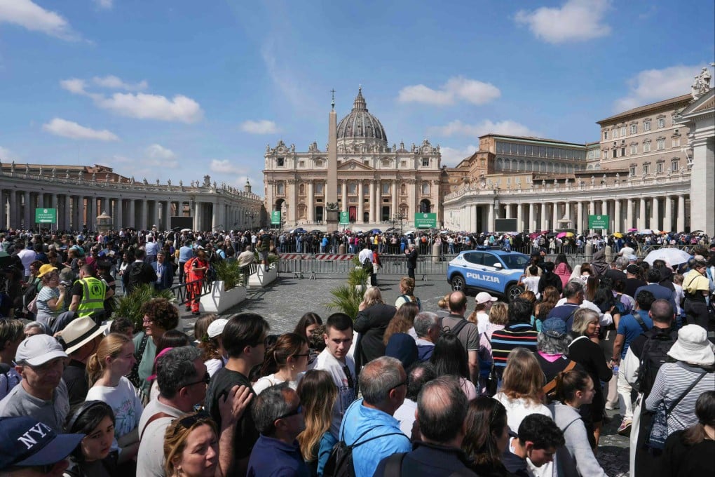 Pilgrims and visitors queue at St Peter’s Square to enter the St Peter’s Basilica and pay their respects to the late Pope Francis in the Vatican on April 23. Photo: AFP