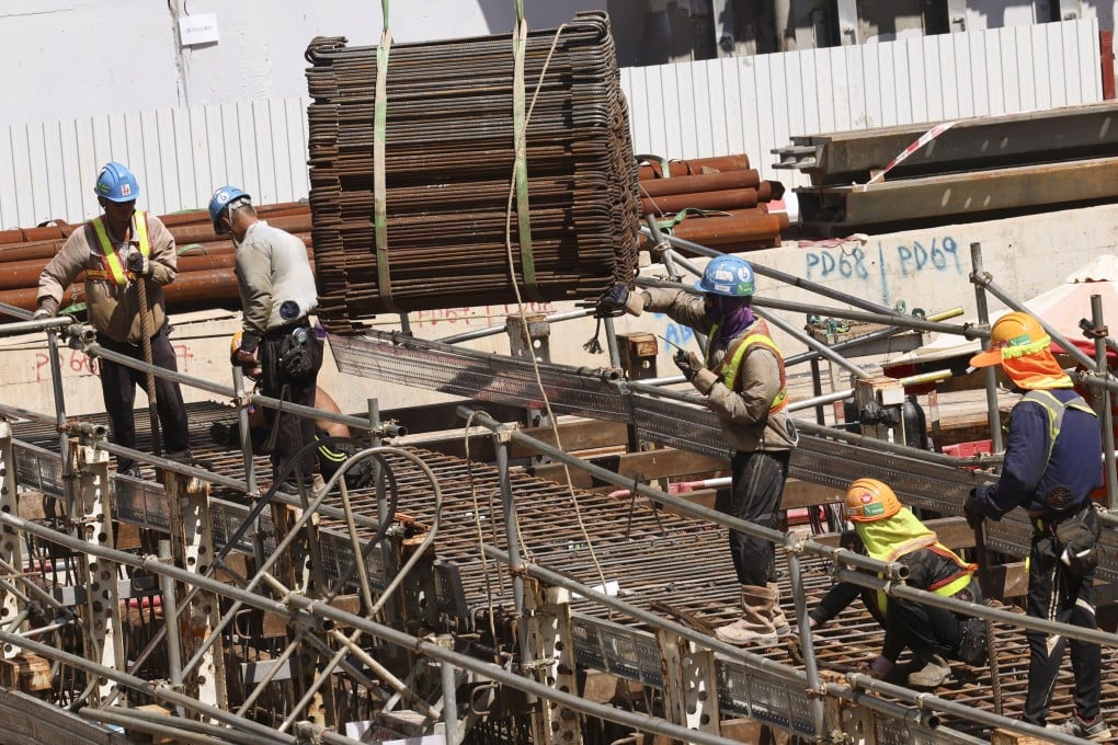 Workers at a construction site in Mong Kok on September 17, 2024. The Observatory recorded a temperature of 35.5 degrees in the afternoon, the hottest ever for mid-autumn. Photo: Jelly Tse