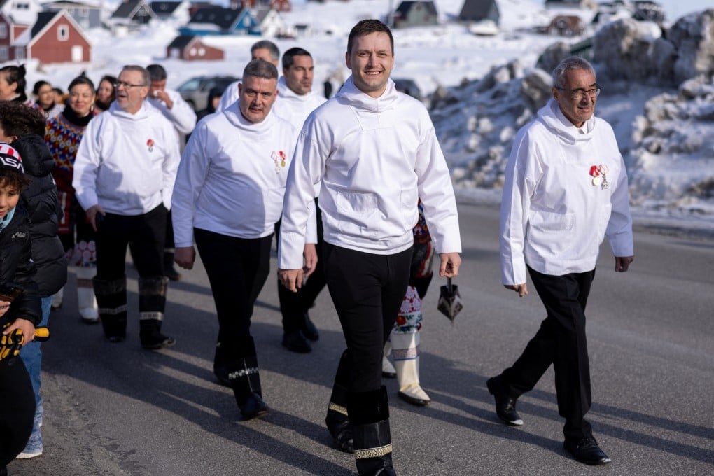 Greenland’s Prime Minister Jens-Frederik Nielsen (centre) in the procession from Hans Egede house to Nuuk Cathedral, where a service was to be held during the constitutive meeting of the newly elected parliament, in Nuuk, Greenland, on April 7. Photo: Reuters
