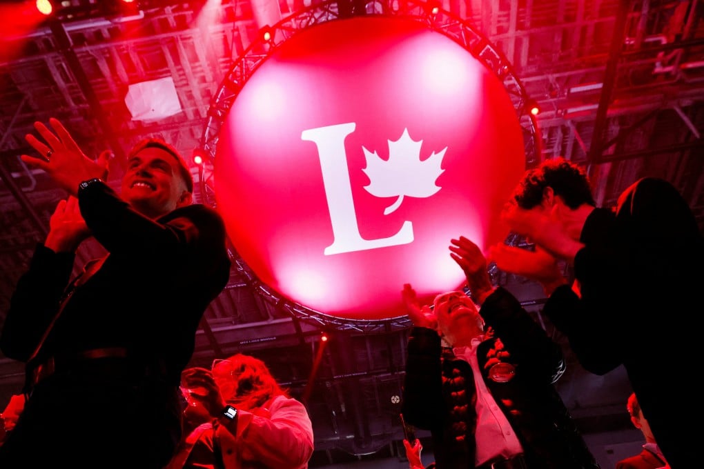 Supporters of Canada’s Prime Minister Mark Carney react to polling numbers in Ottawa. Photo: Reuters