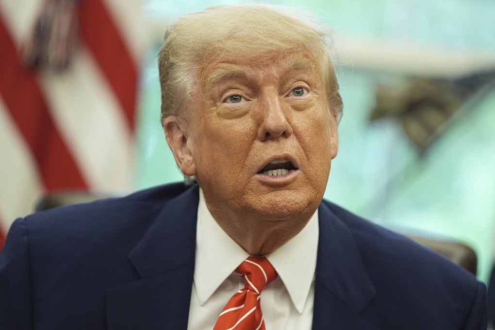 US President Donald Trump speaks with reporters after announcing a trade deal with Britain in the Oval Office of the White House on Thursday. Photo: AP