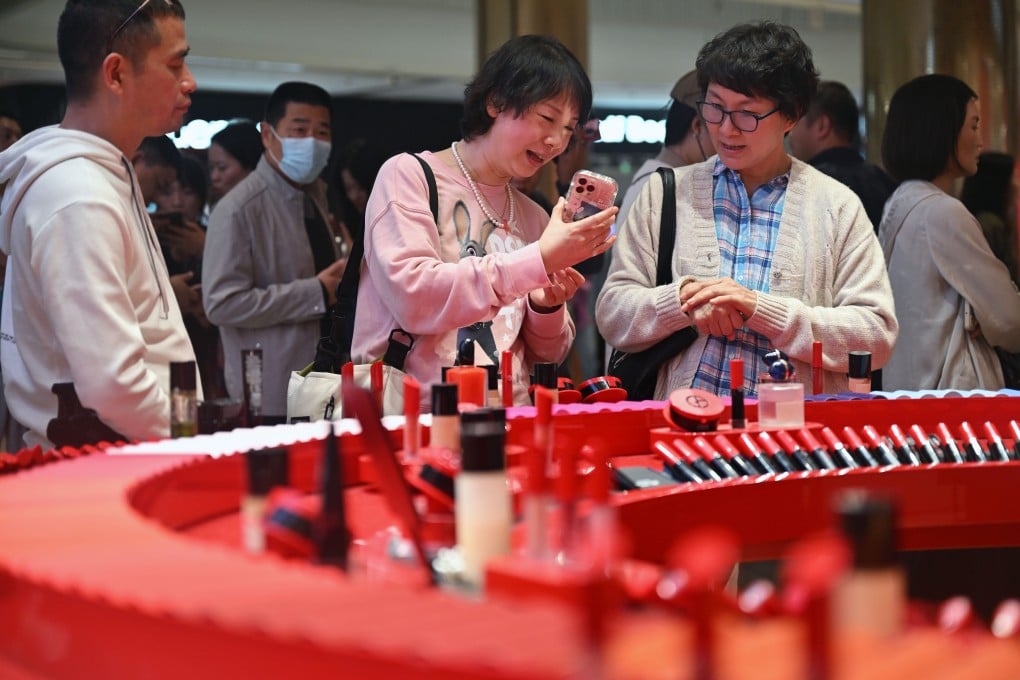Customers browse a cosmetics store inside a duty-free mall in Haikou, Hainan province. The island’s duty-free shops are expected to attract more customers amid the US-China trade war. Photo: Xinhua