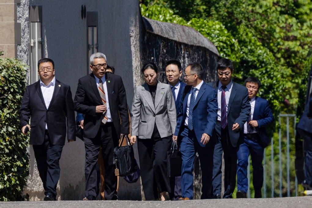 Members of the Chinese delegation leave a residence where trade talks between the US and China are taking place, in Geneva on Saturday. Photo: Reuters
