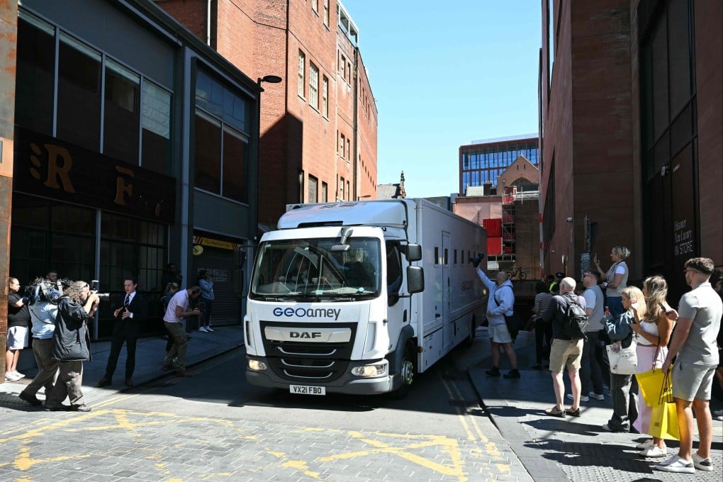 A prison van leaves from the back of the courts shortly after US rapper Chris Brown attended a hearing inside Manchester Magistrates’ Court in north-west England on Friday. Photo: AFP