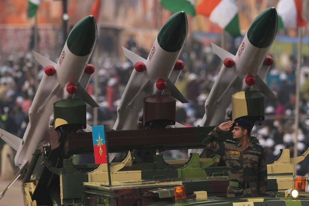 A soldier salutes next to an Akash missile system during a parade in New Delhi. India is planning to deliver a second batch of Akash-1S surface-to-air missile systems to Armenia under a 2022 treaty. Photo: AFP