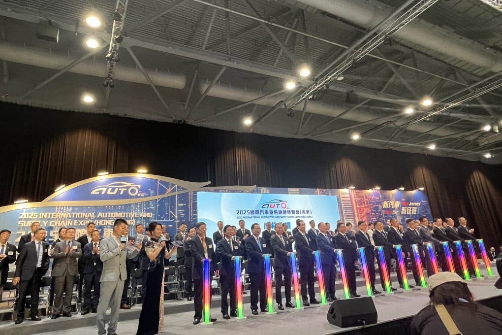 Hong Kong’s Chief Executive John Lee (eighth from the left) officiating the opening of the 2025 Hong Kong Automotive Expo at the AsiaWorld Expo on June 12, 2025. Photo: Cao Li