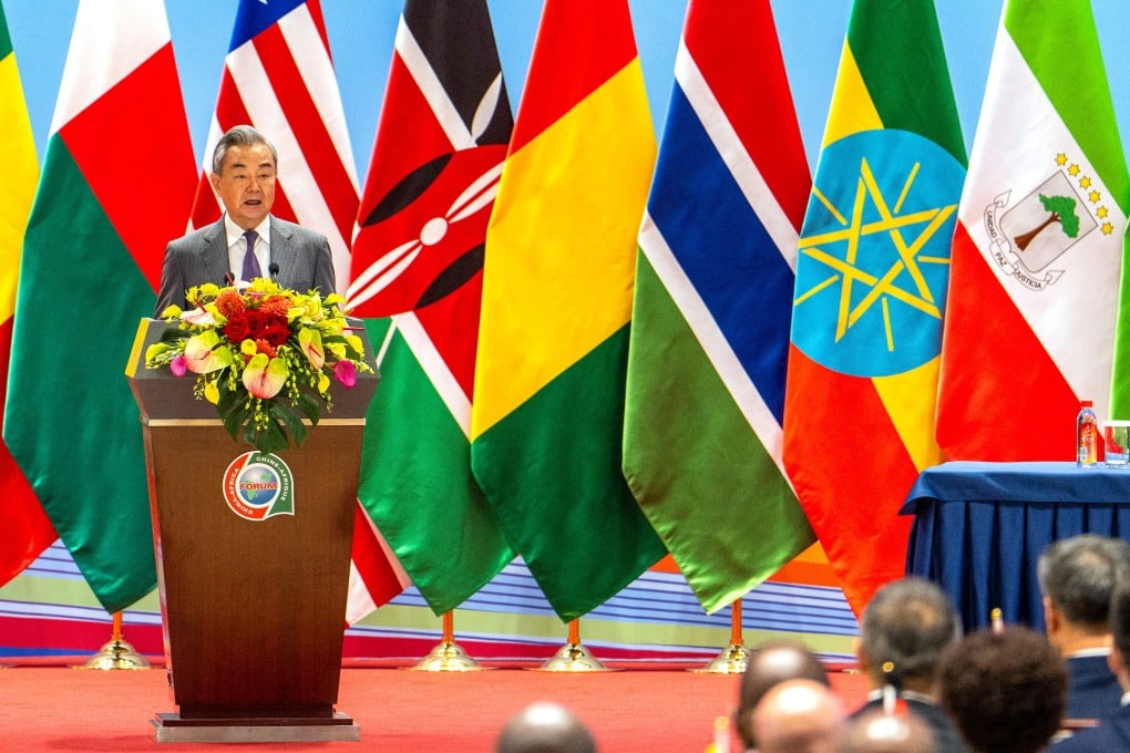 Chinese Foreign Minister Wang Y reads a letter from President Xi Jinping to a FOCAC meeting in Changsha on Wednesday. Representatives of China, 53 African countries and the African Union Commission attended the meeting. Photo: Xinhua